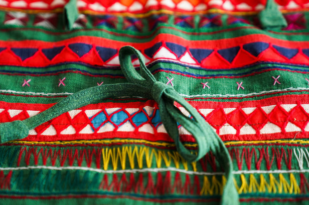   Ethically rooted Sustainable growing brand. Mamma Nomad. Beautifully Handmade Ergonomic Mei Tai Babycarrier with cotton slings. 